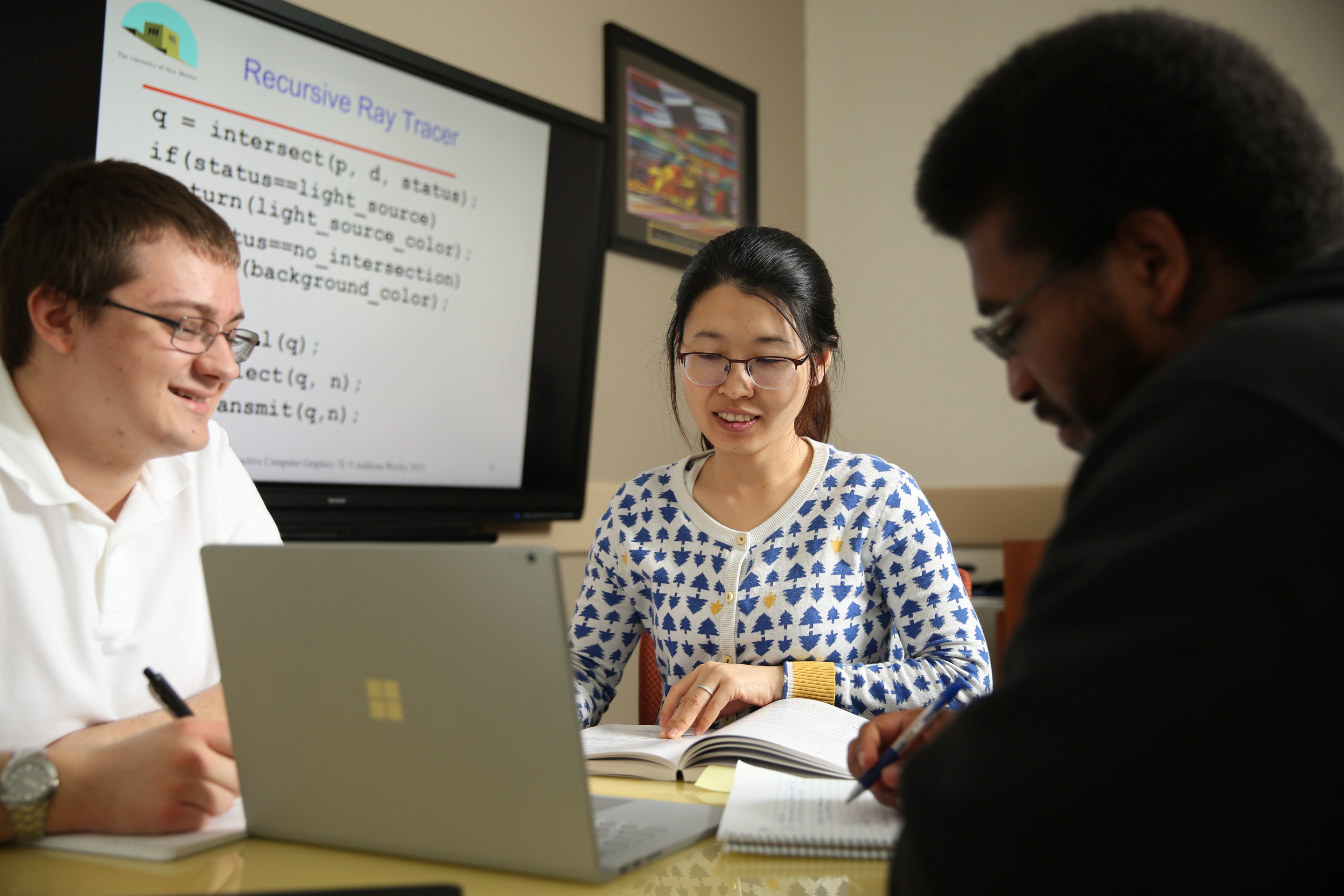people working at a computer