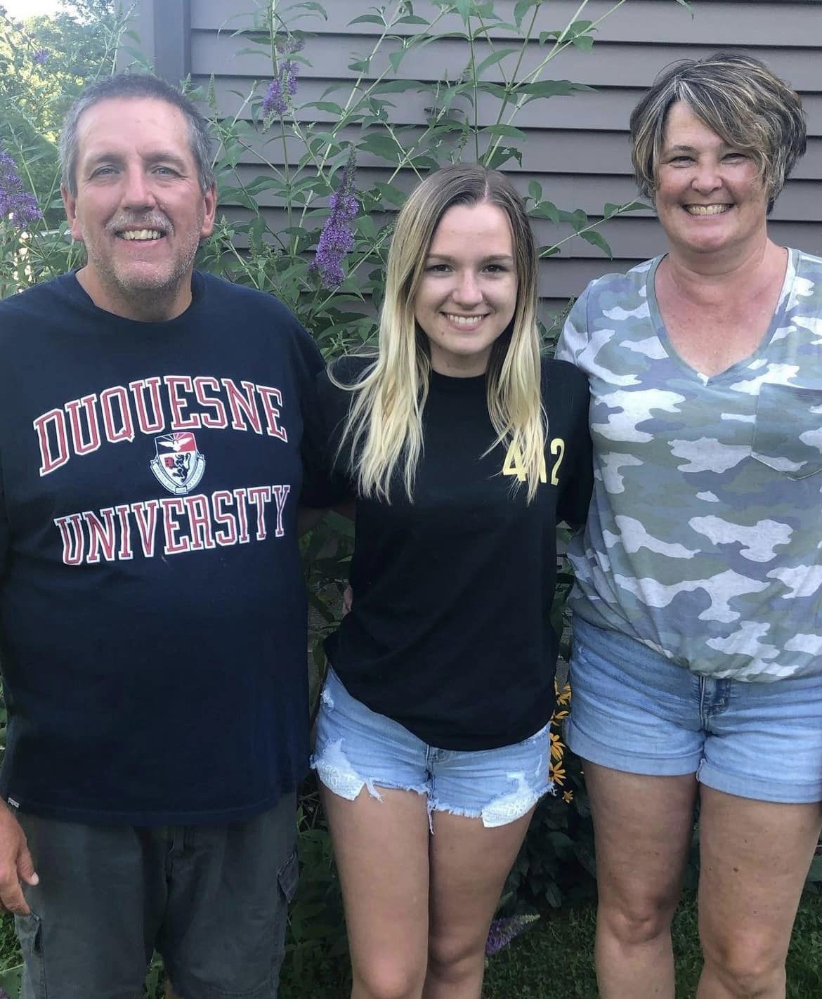 Madison with her parents
