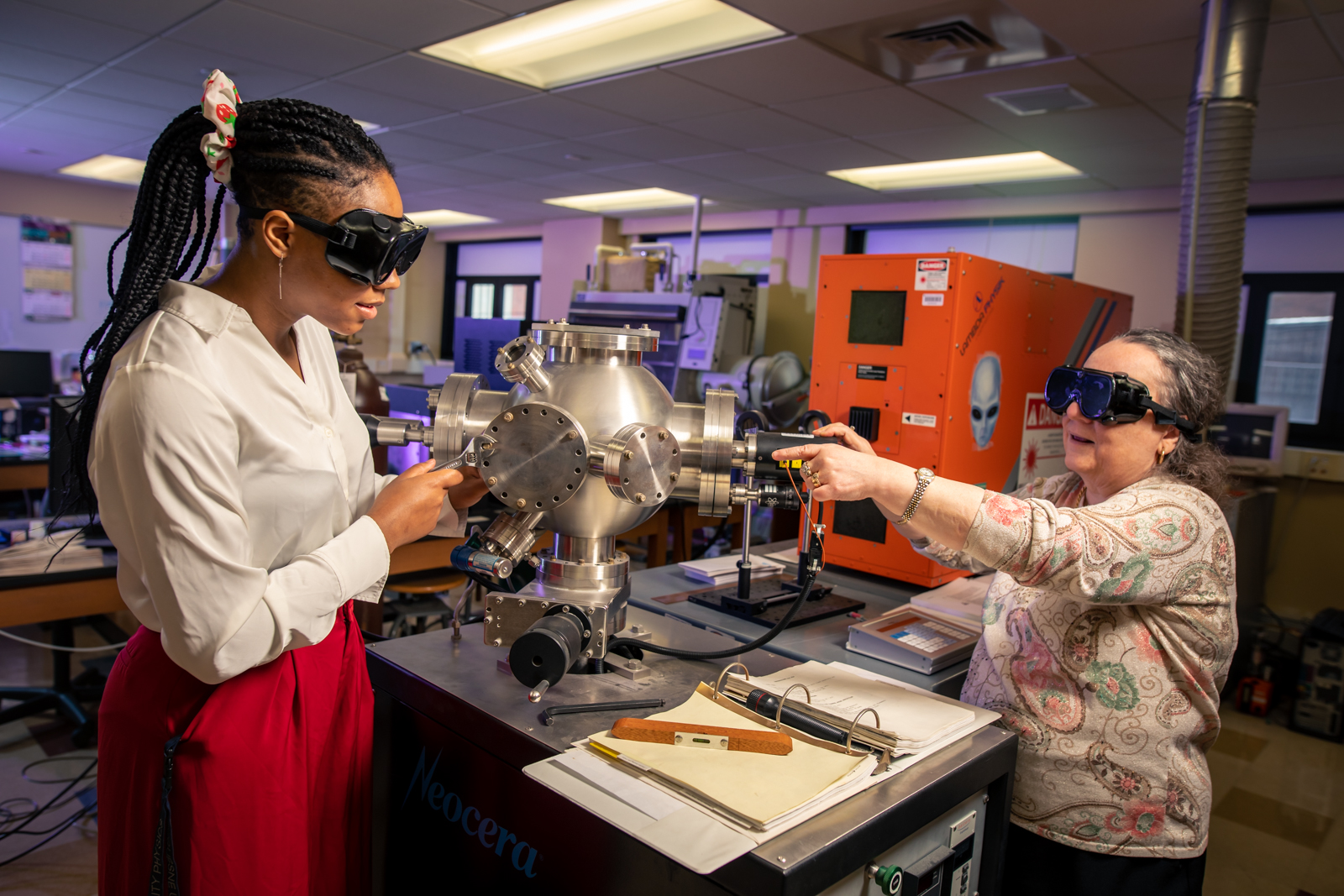 a teacher teaching physics