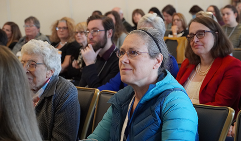 conference audience listening