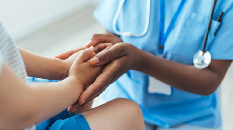 nurse assisting patient