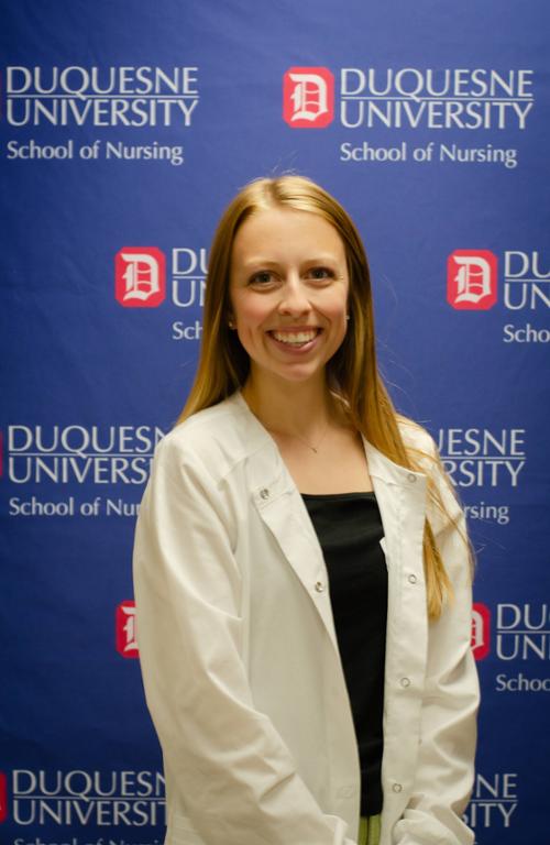 female nurse wearing white coat