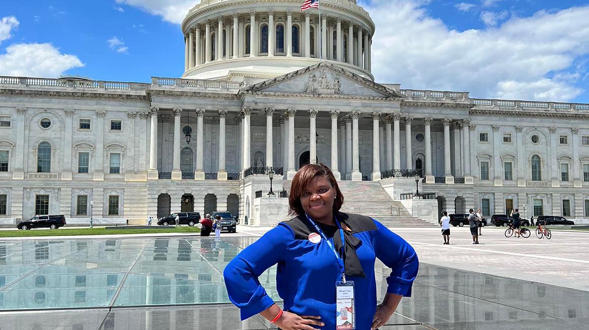 Khaliah Fisher-Grace in front of the Capitol Building