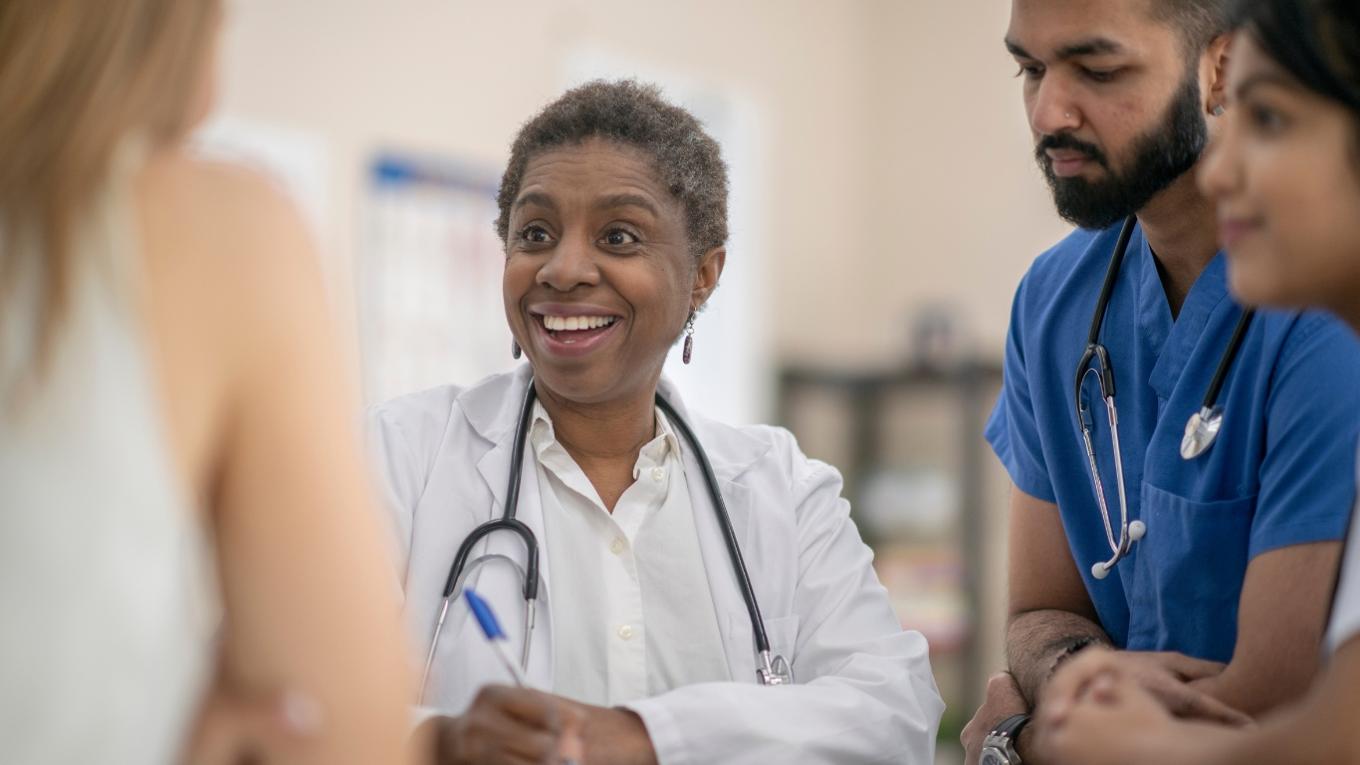 faculty with nursing students in clinical