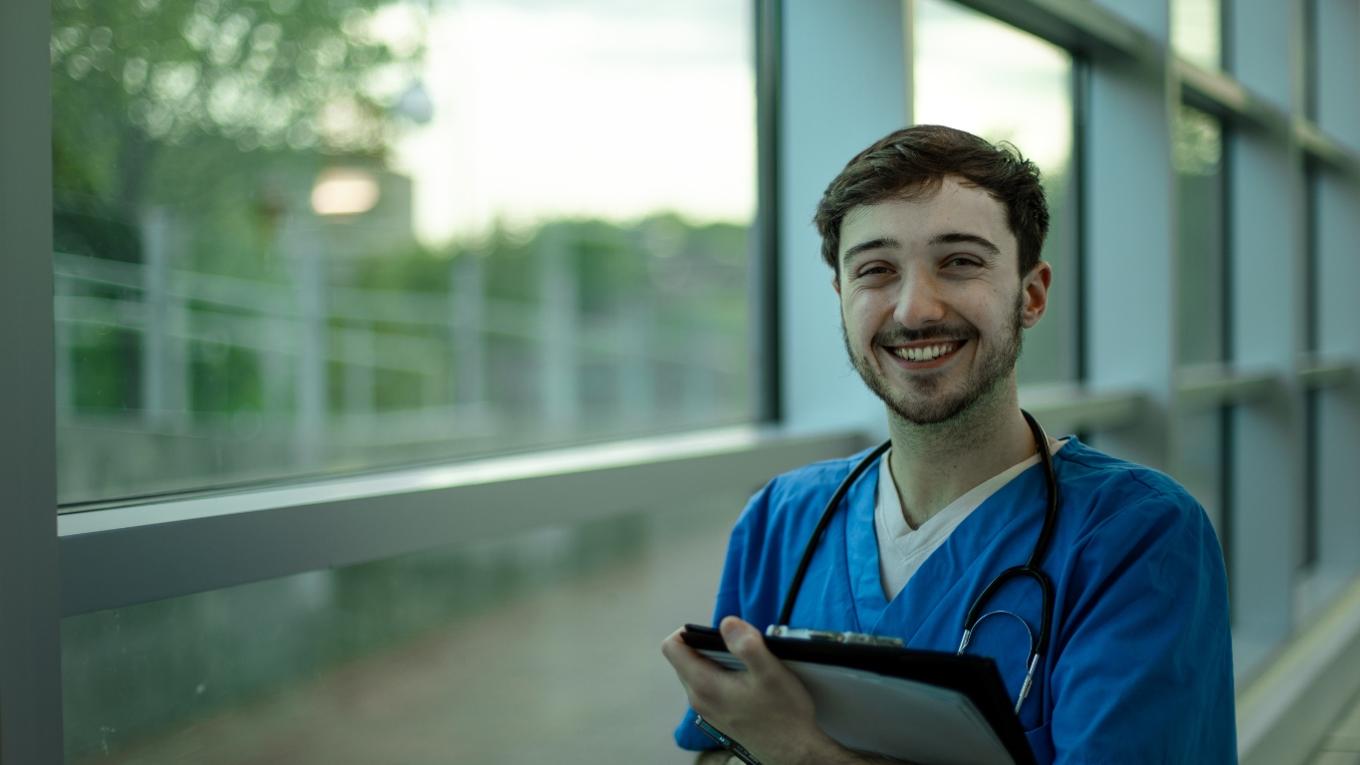 male nurse in hallway