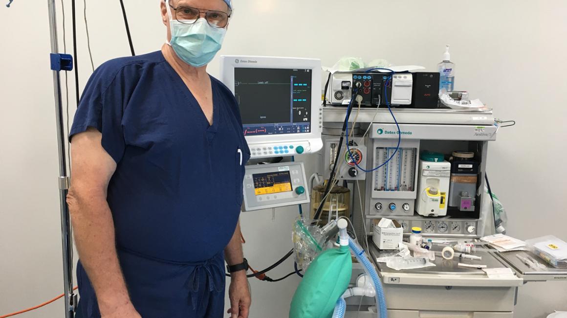 Francis Feld in scrubs.