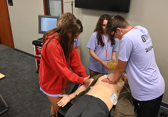 Prospective students learn about SimMan hands-on.