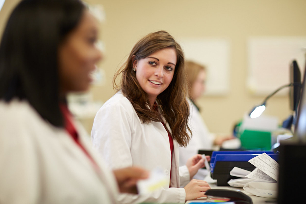 Pharmacist at her workstation