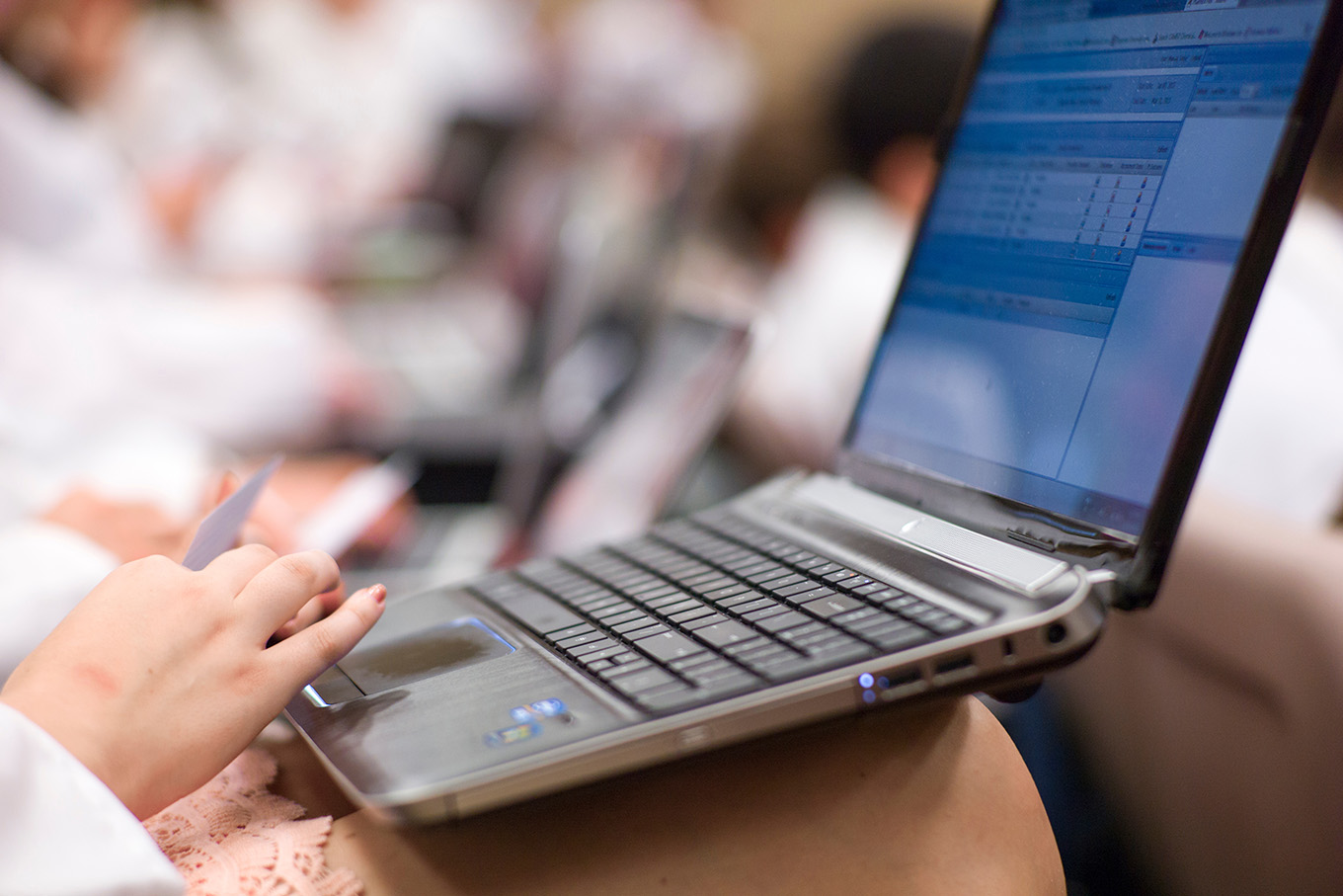 Duquesne University School of Pharmacy student using a laptop