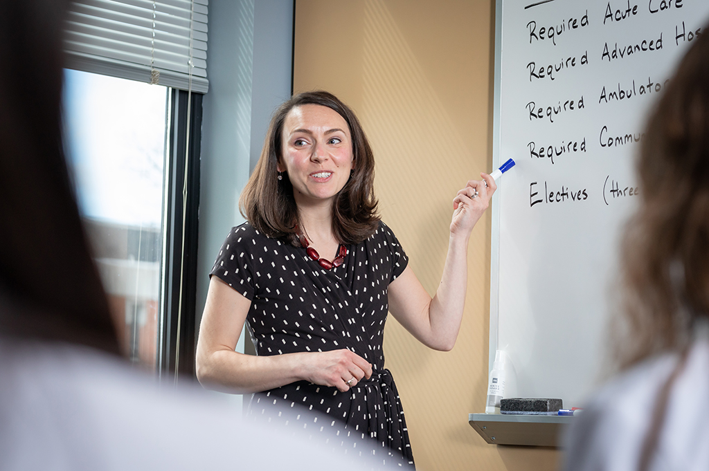 Faculty members leading a class discussion