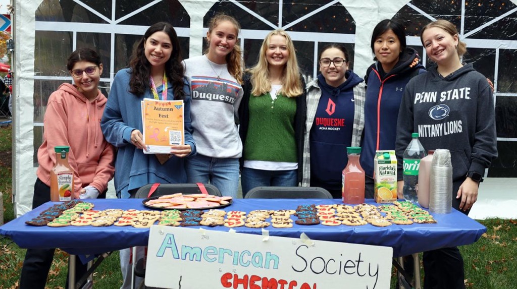 two people making liquid nitrogen ice cream