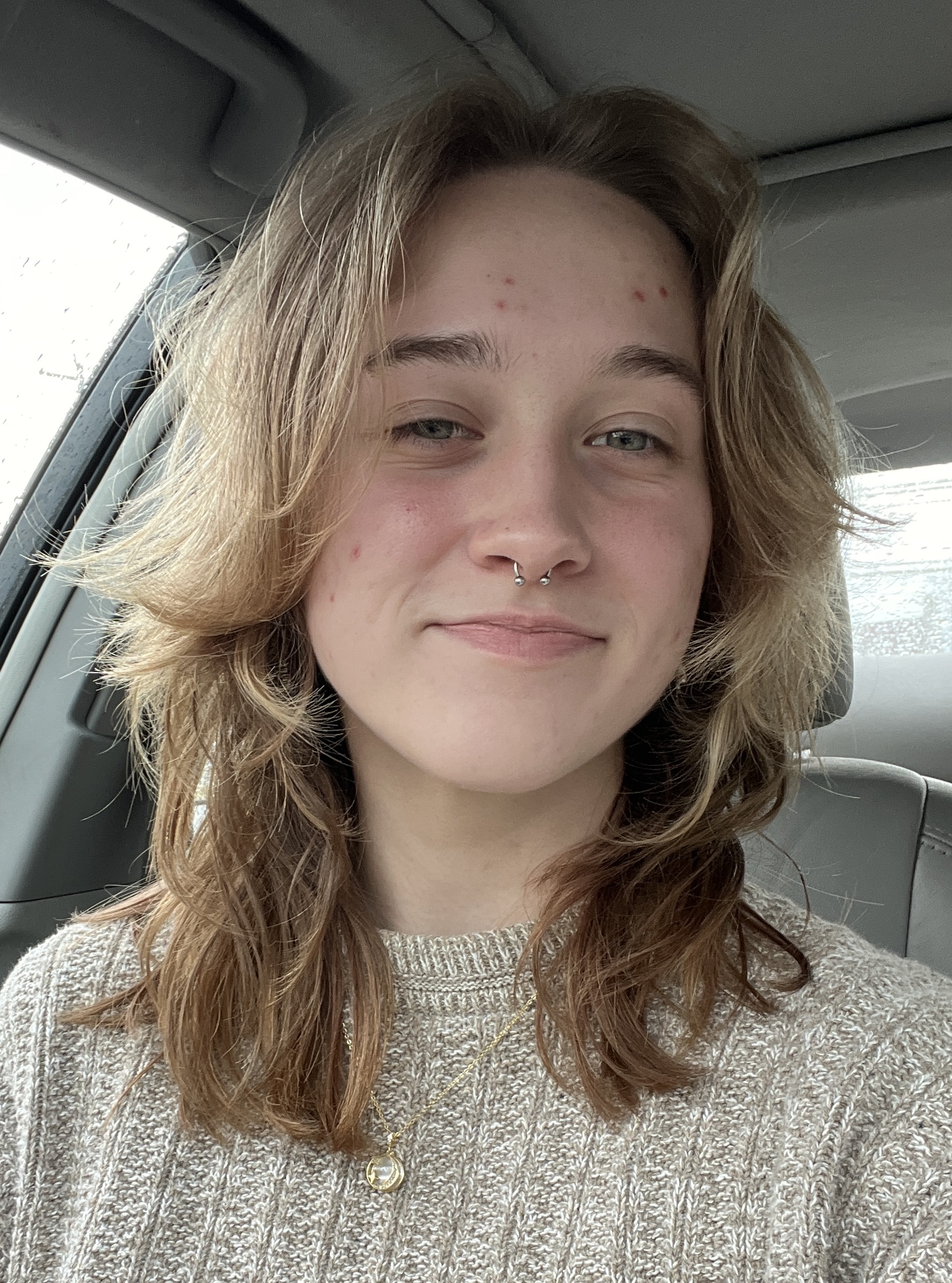 girl in a grey sweater