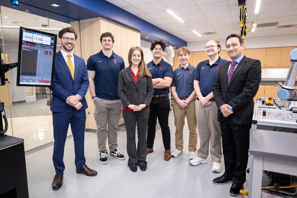 Dr. Amin Ghorbanpour with department chair Dr. Katherine Hornbostel, Assistant Professor of Mechanical Engineering Dr. Caleb Foster and mechanical engineering students.