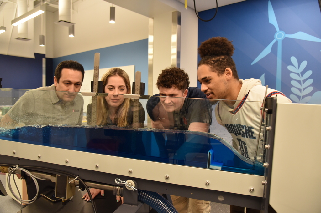 a picture of a student working in a labratory