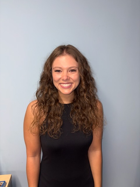 a girl in a black dress