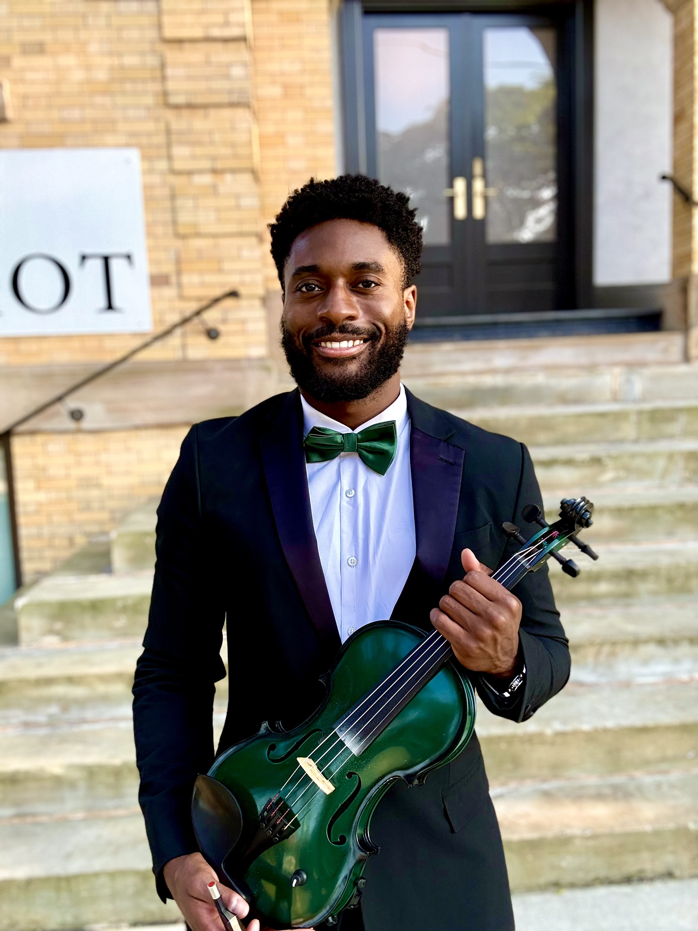 a male with a violin