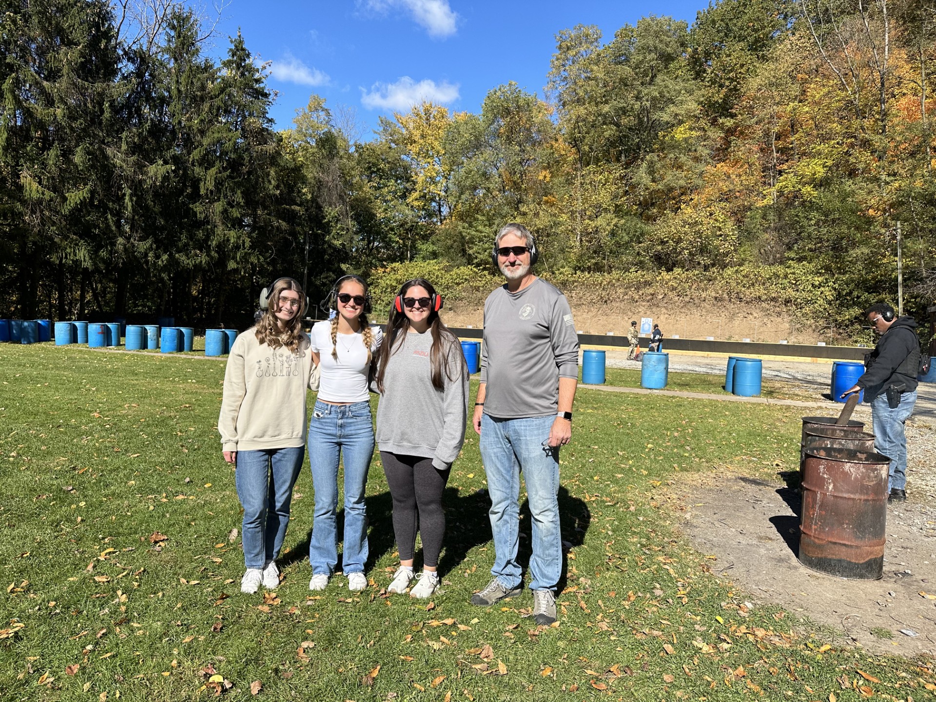 Melanie Tanis with mentor, Professor Regentin, at the shooting range