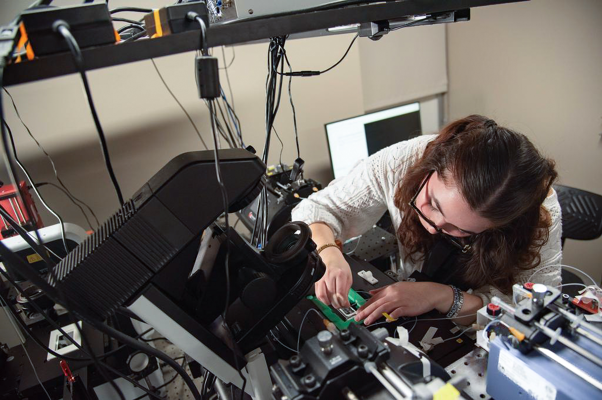 man looking at a sand table