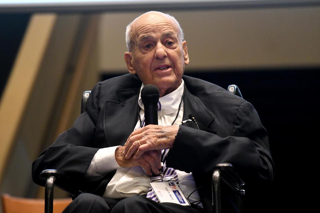 man talking into a microphone