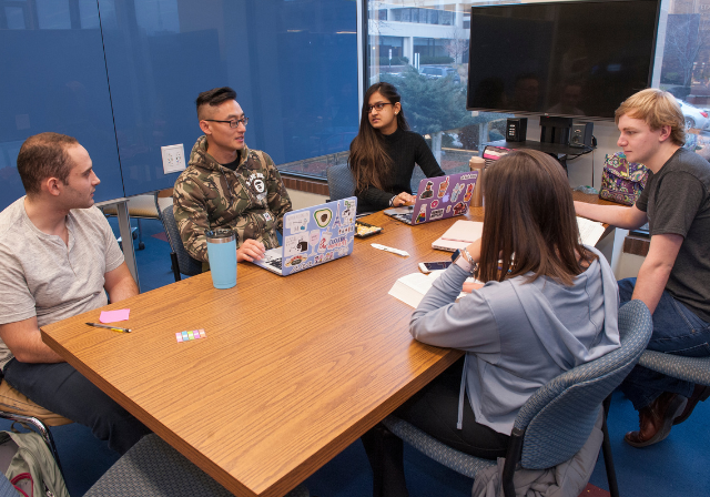 Students studying in the library's electronic classroom.