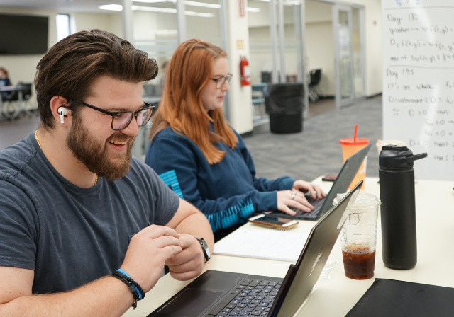 Students working in the library.