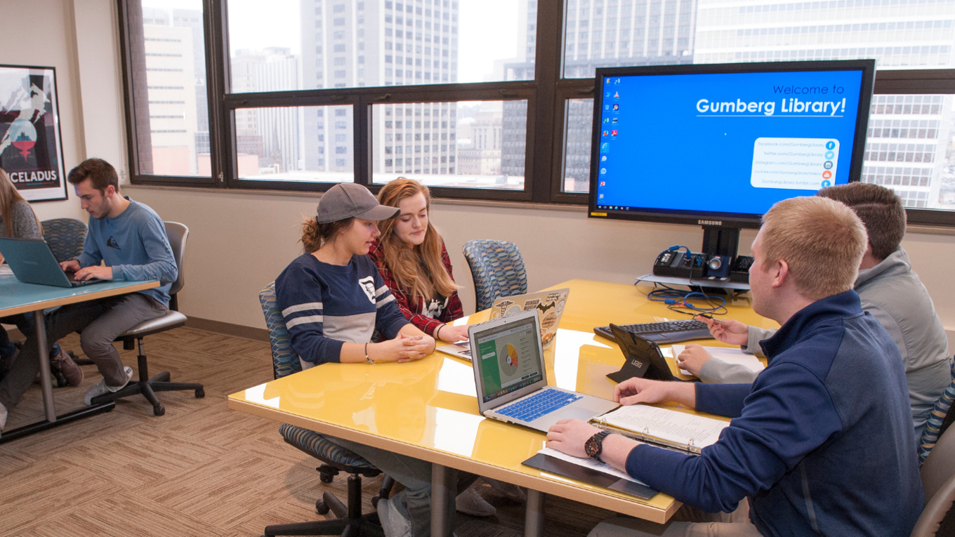 Students studying at a table