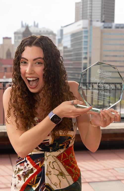 Jessica Schmitz with her spirit of diversity award