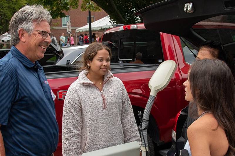 Student Move-In Day 2022. A photo of President Gormley talking with students