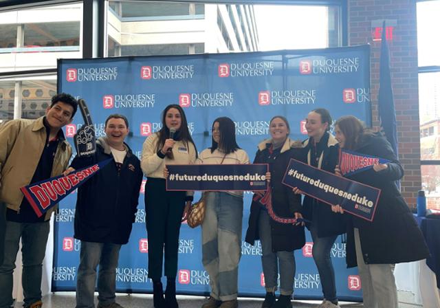 students celebrating at an admitted student event