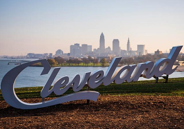 Cleveland script sign and skyline