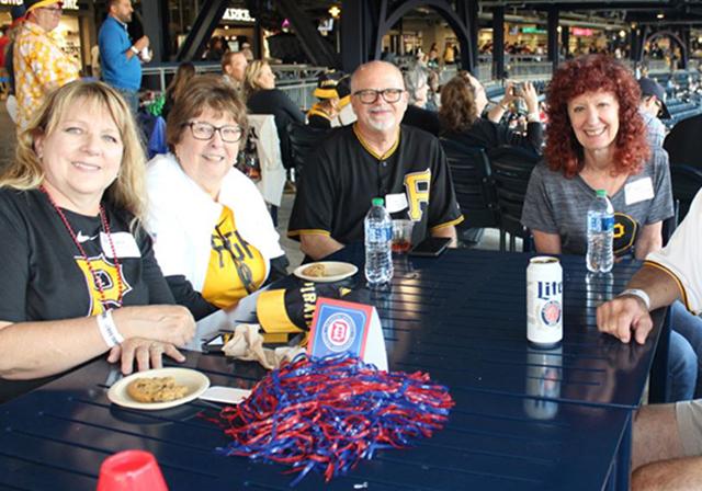 Alumni enjoying Duquesne Night with the Pirates