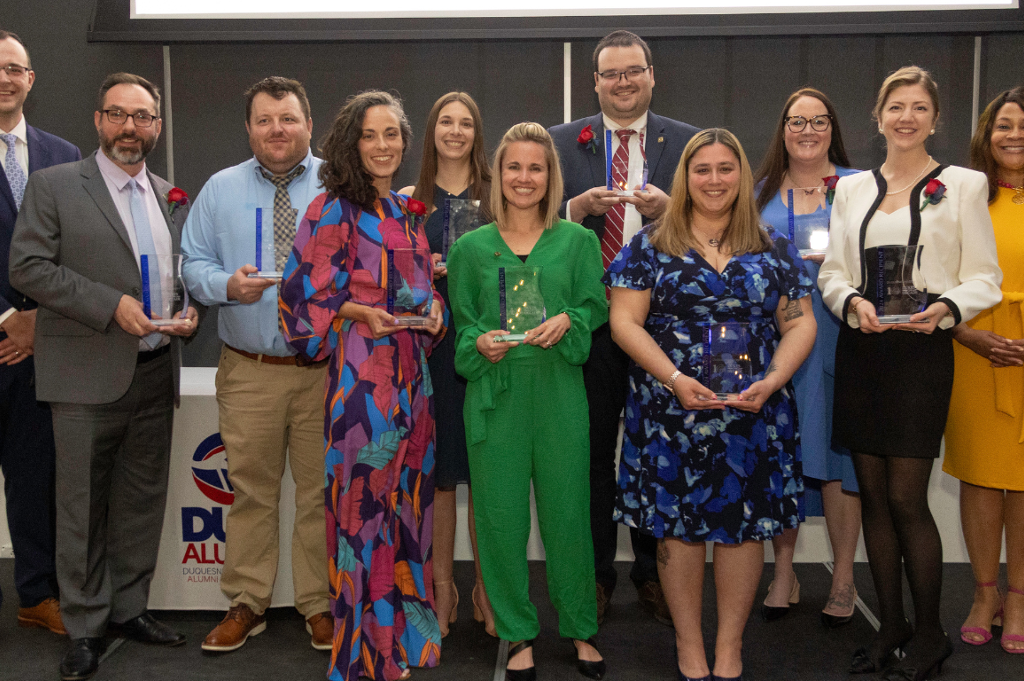 The 2024 winners of the Dukes from the Last Decade awards posing with their awards.