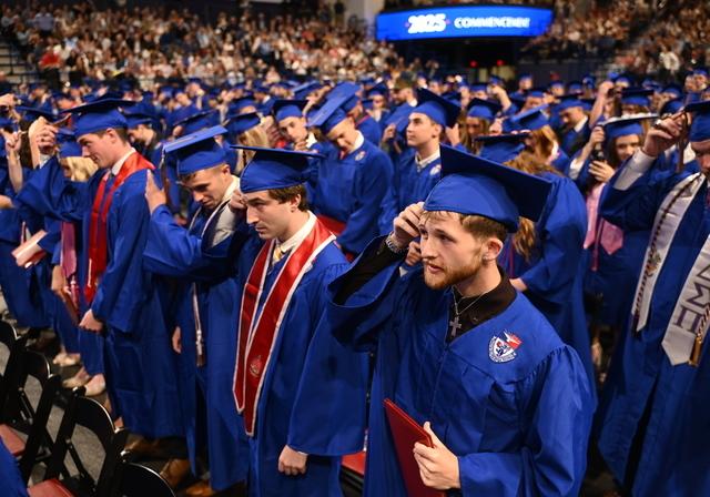 Students graduating in the Cooper Fieldhouse.