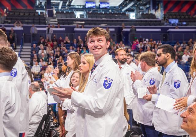 Medical students celebrate during White Coat Ceremony