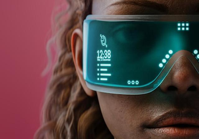 Young person wearing AI goggles.