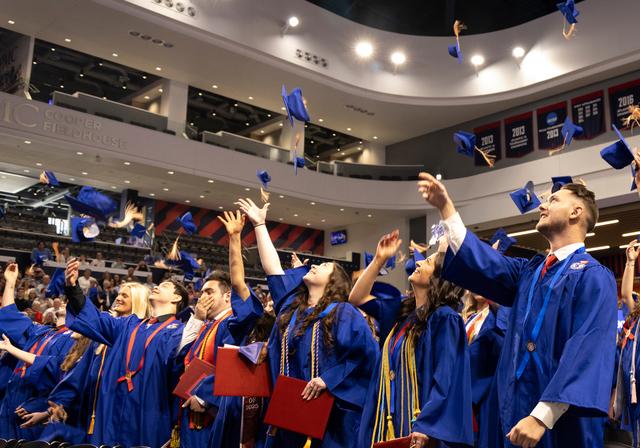 Students graduating in the Cooper Fieldhouse.