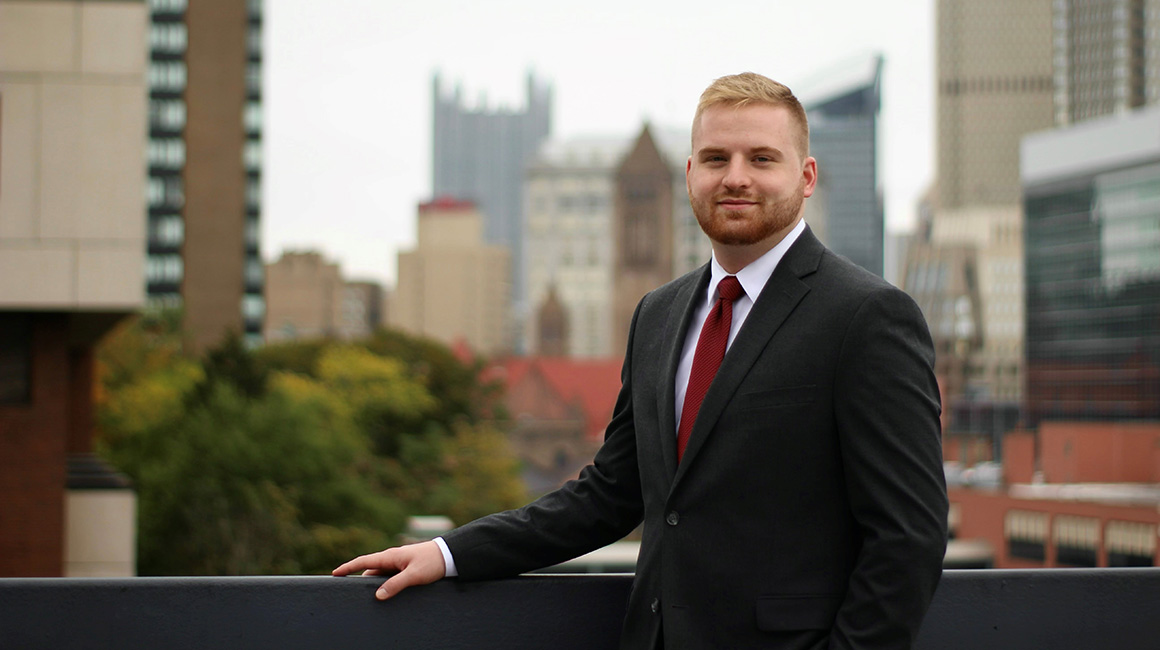 Zachary Valkovci portrait with city in the background