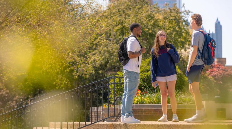 students talking on campus