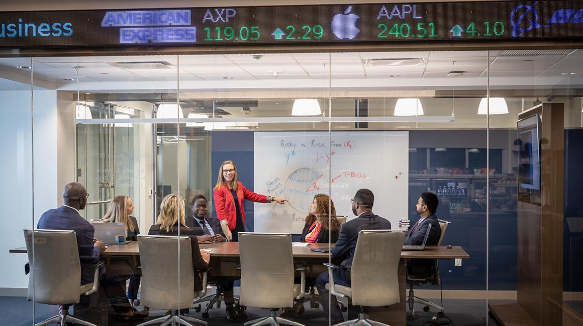 Students meeting in Business School conference room