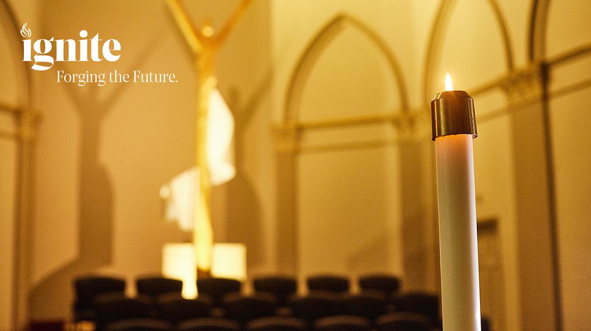 Lighted candle in Duquesne Chapel