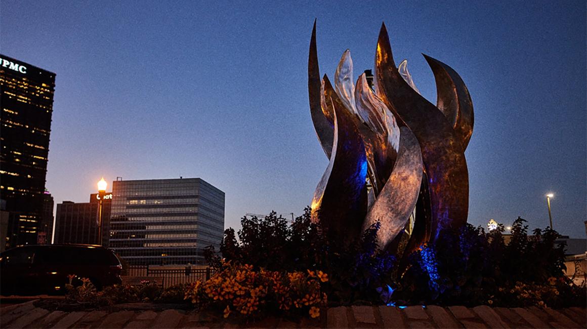 Flame sculpture at night