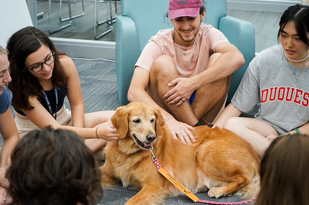 Students with dog.