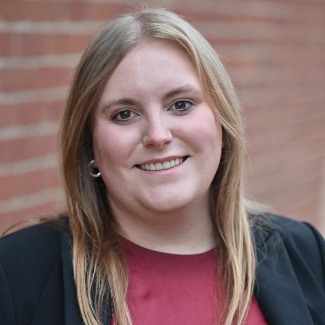 Professional headshot of Kylie Woodward