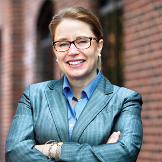  Headshot Dr. Tammy Hughes outside with Canevin Hall in the background