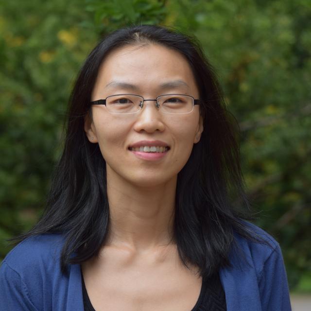 Headshot of Dr. Yihhsing Liu on campus with trees in background