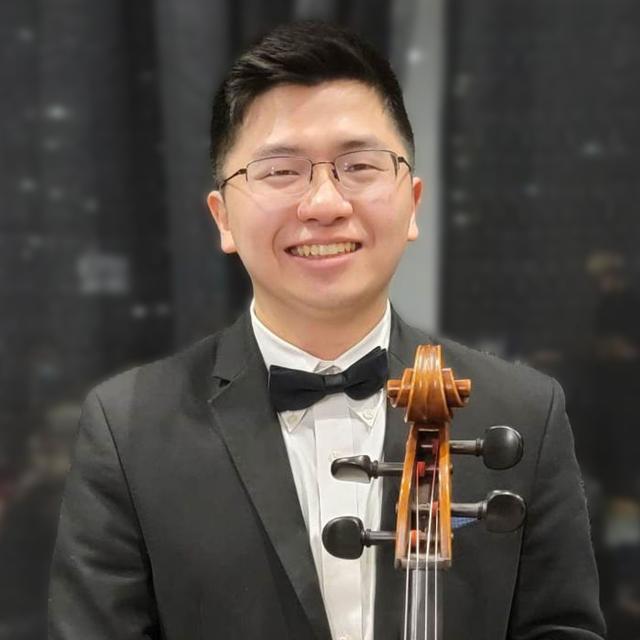 Yu-Chen Shih poses for headshot with string instrument