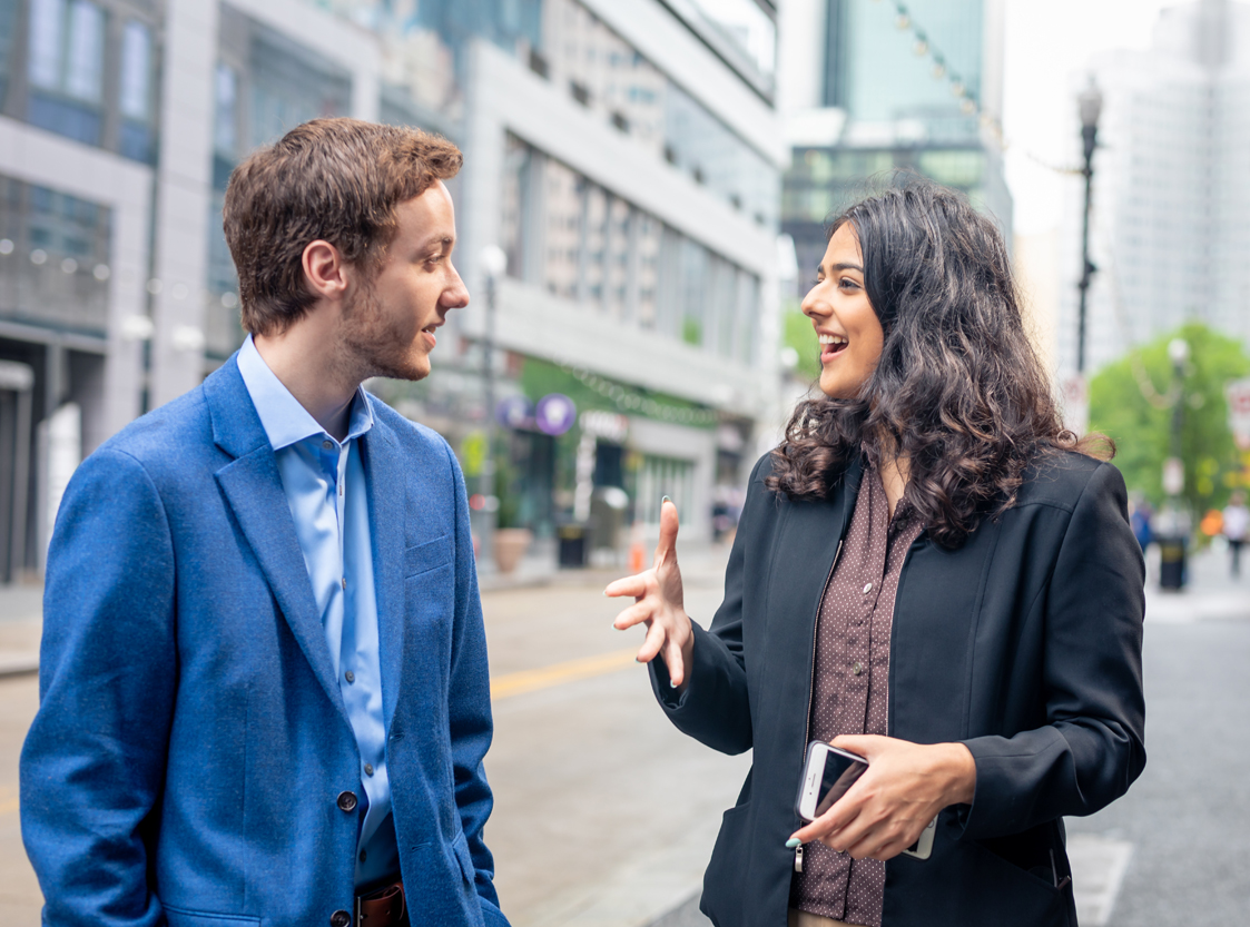 Male and female young professionals in downtown Pittsburgh