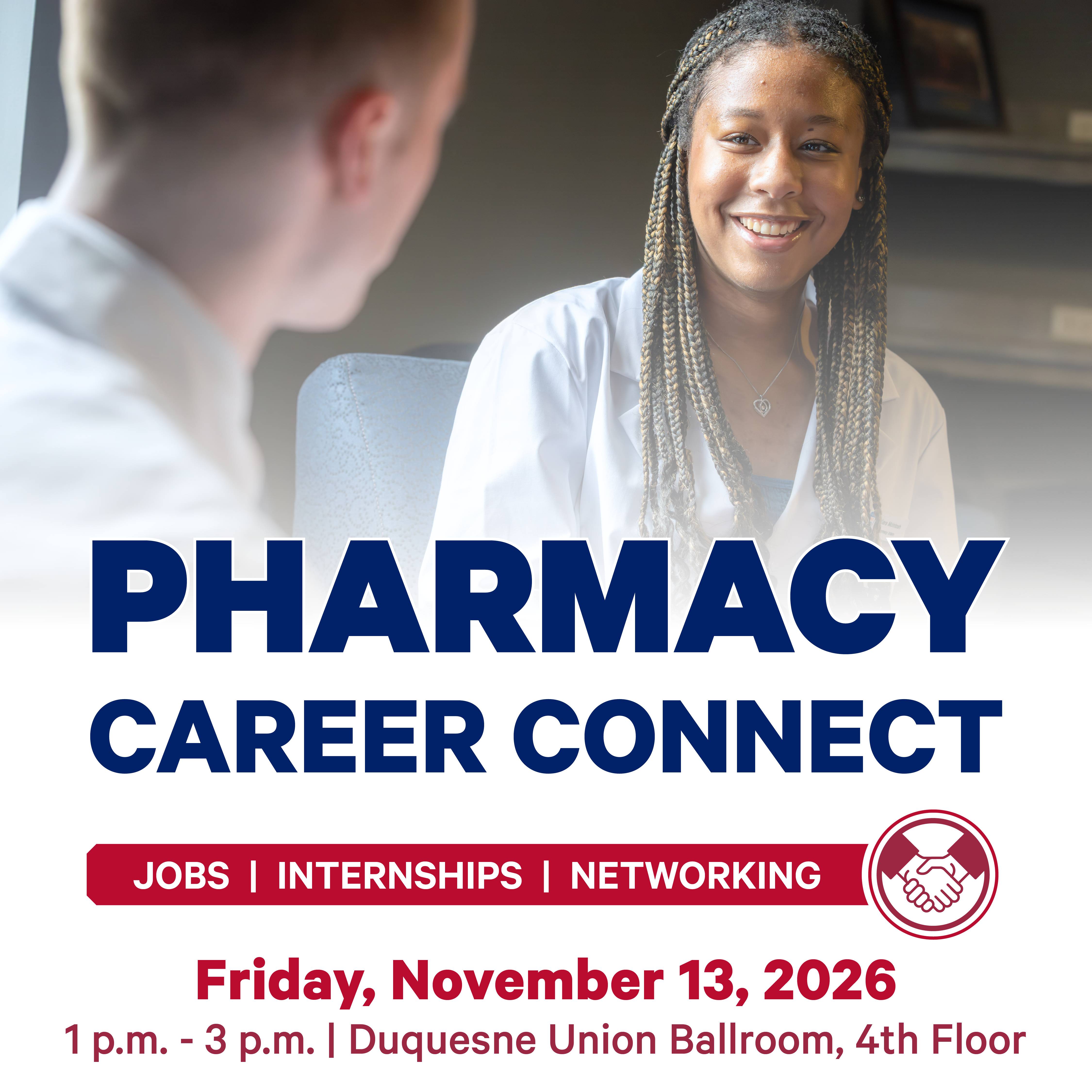 A Pharmacy student smiles in conversation with a professional