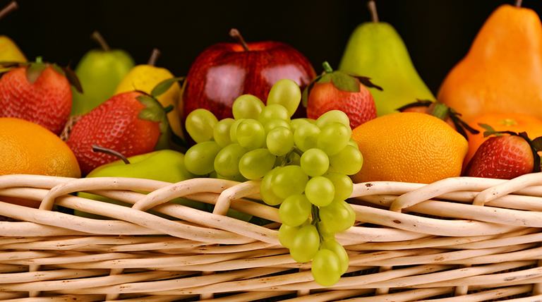 Basket of fresh fruit.