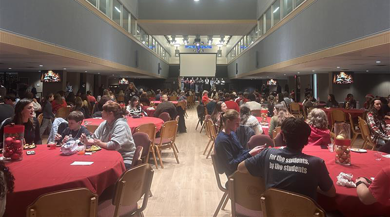 Students eating in the ballroom